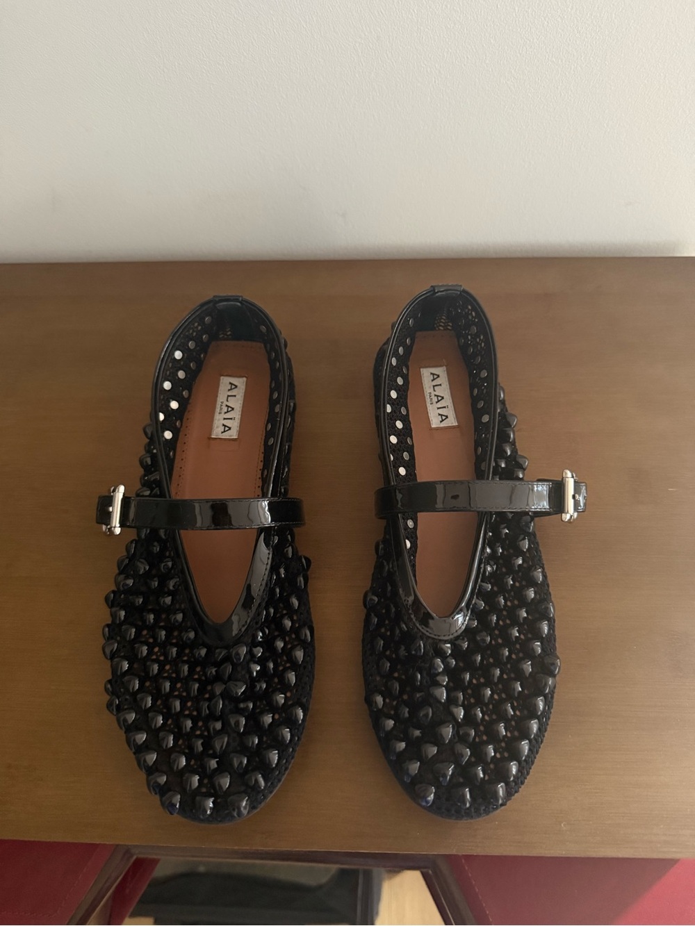 Alaia Black Studded Patent Mary Jane Flats with Strap